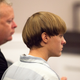 Dylann Roof, right, 21, listens to proceeding with assistant defense attorney William Maguire during a hearing at the Judicial Center July 16, 2015 in Charleston, South Carolina. Roof is charged with murdering nine worshippers at a historic black church in Charleston last month.